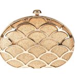 Glamour and Grace_ Mastering the Art of Wearing a Gold Clutch